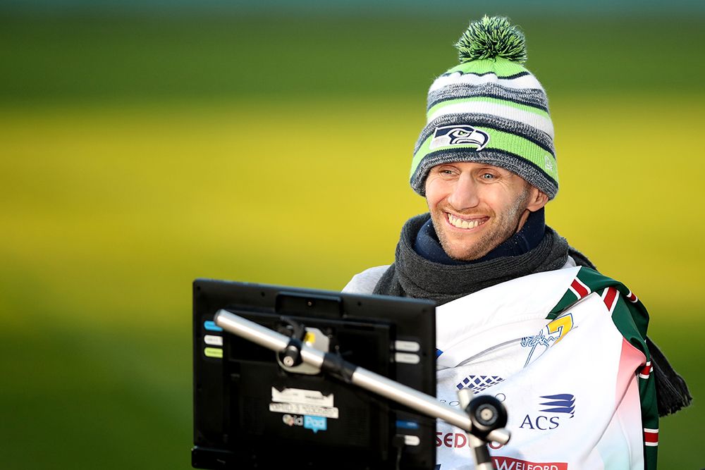 Rob Burrow smiles as Ex-Leeds Rhinos rugby league player Kevin Sinfield completes his Extra Mile Challenge at Emerald Headingley Stadium